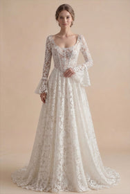 Load image into Gallery viewer, AKAY Gelinlik’e ait uzun kollu dantel A kesim gelinlik modeli. Transparan detaylı üst beden, floral işlemeler ve zarif kuyruk formuyla modern romantik bridal couture tasarım.
